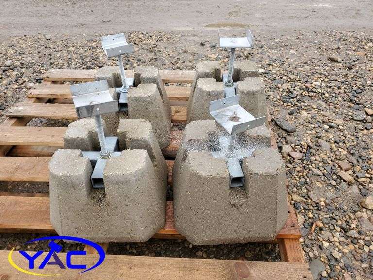 4 Cement Blocks W/ Leveling Posts\ Yorkton Auction Centre