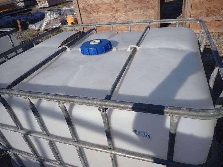 Schutz Caged Water Tank Yellow Tag Auctions